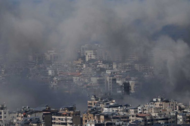 Smoke rises following an Israeli airstrike in Dahiyeh, Beirut's southern suburbs, Lebanon, Monday, March 9, 2026. (AP Photo/Bilal Hussein)