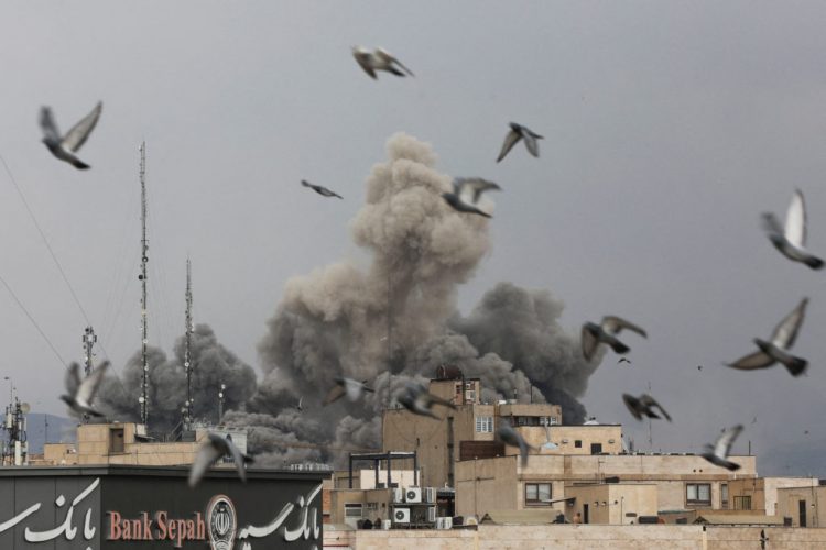 Birds fly as smoke rises following an explosion, after Israel and the U.S. launched strikes on Iran, amid the U.S.-Israel conflict with Iran, in Tehran, Iran, March 2, 2026. Majid Asgaripour/WANA (West Asia News Agency) via REUTERS ATTENTION EDITORS - THIS PICTURE WAS PROVIDED BY A THIRD PARTY     TPX IMAGES OF THE DAY